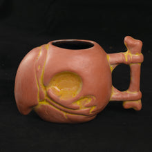 Load image into Gallery viewer, Parrot Skull Tiki Mug, Matte Terra Cotta and Yellow with Black Interior